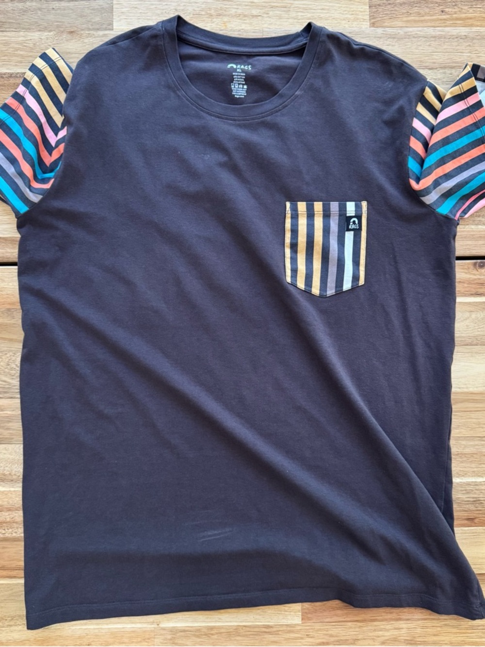 RAGS- Unisex Black Pocket Tee with Multicolor Striped Sleeves